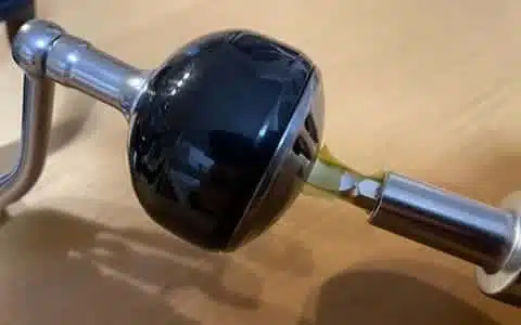 Upgrading Twin Power SW with Gomexus Power Knob 4 Fishing reel component with yellow liquid