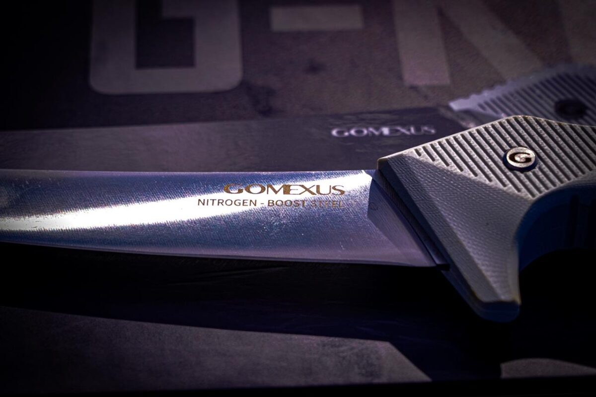 Close-up of Gomexus G-Knife blade made of N-Boost high nitrogen steel for saltwater corrosion resistance