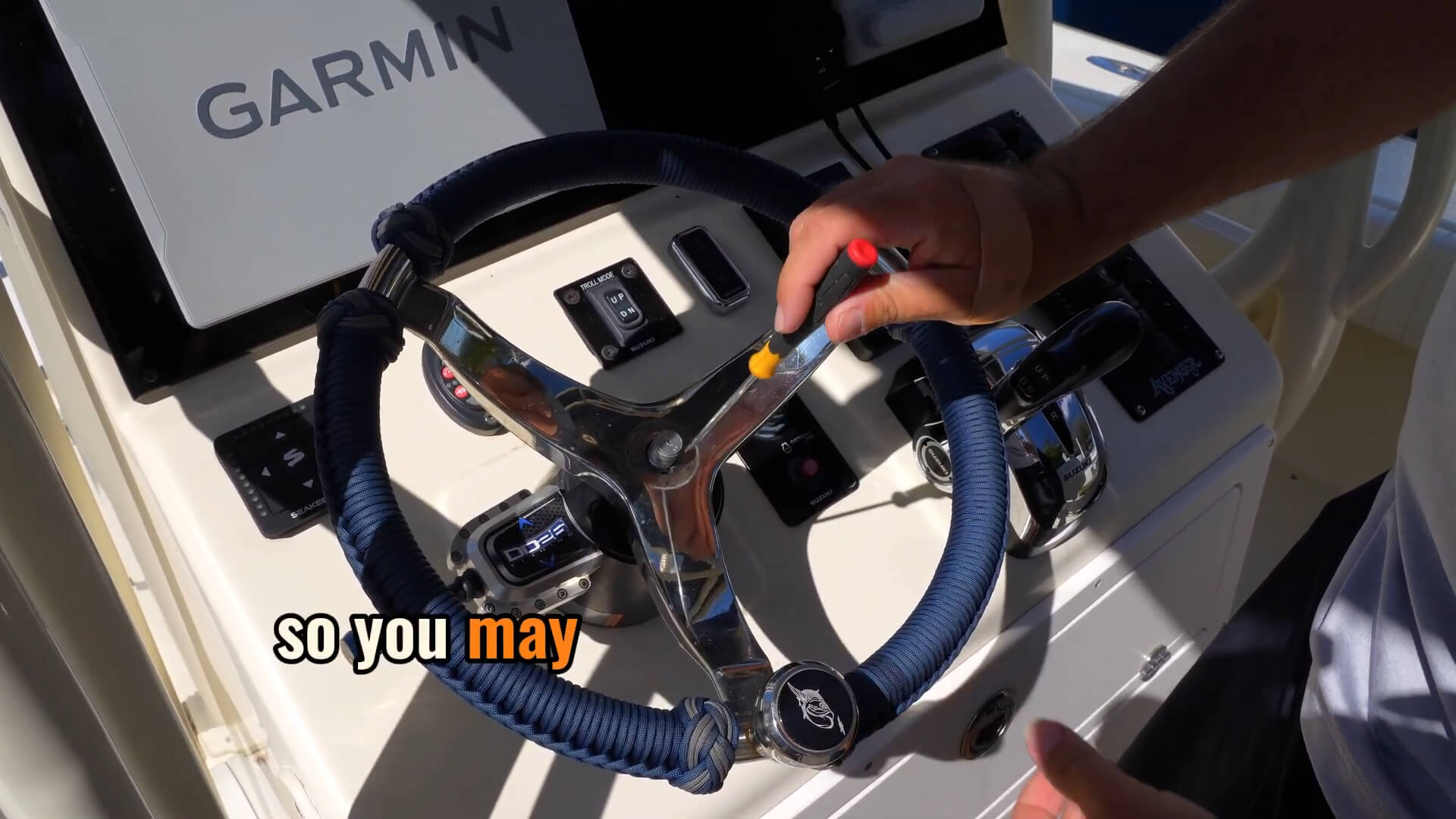 Boat steering wheel installation - Removing old boat steering wheel center cap and lock nut with wrench